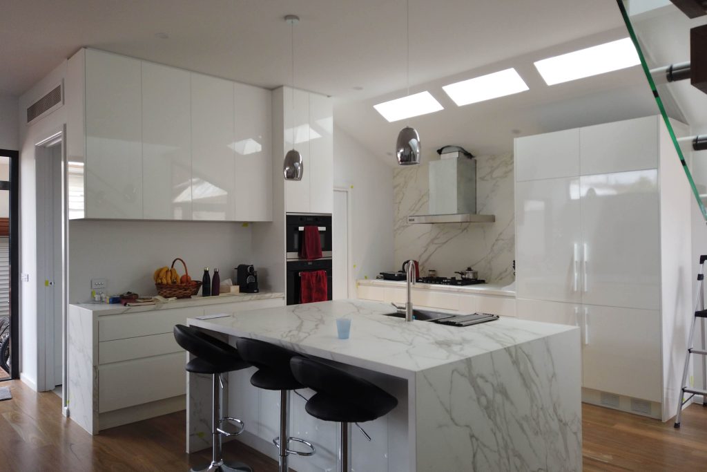 Modern kitchen with marble island.