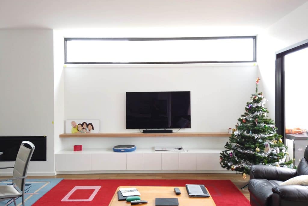 Modern living room with Christmas tree
